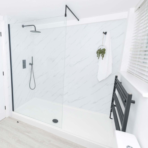 Downstairs black and white bathroom shower and radiator