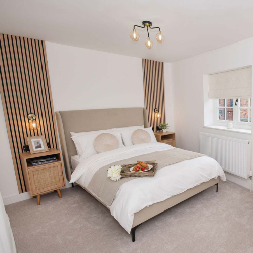 The Malt House master bedroom - bed and bedside tables