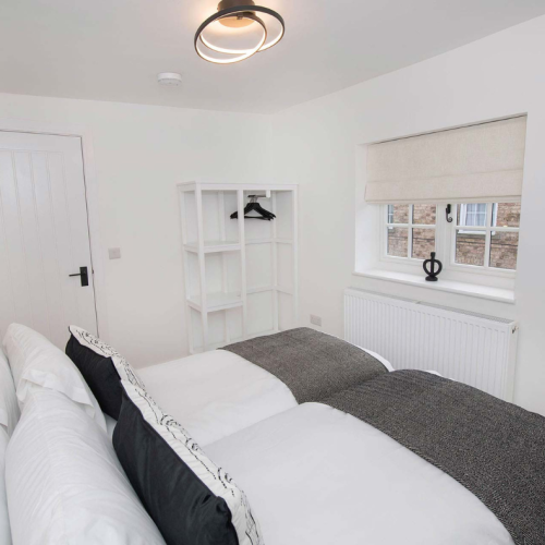 The Malt House bedroom two set up with twin beds